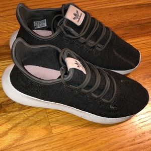 Olive green adidas tubular sneakers